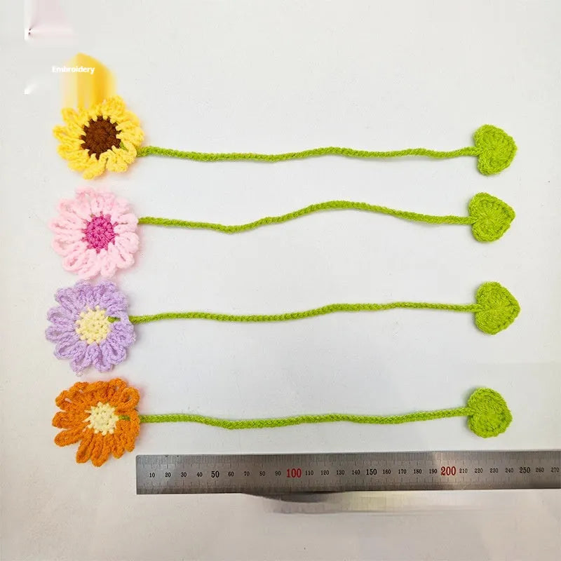 Hand-crocheted daisy bookmark with flexible wire frame in yellow colour option