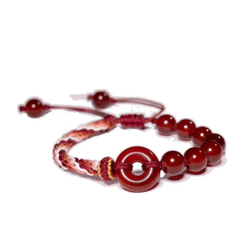 Red agate carrying strap bracelet with elk element on neutral background