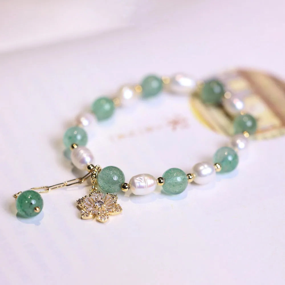 Green freshwater pearl bracelet with Chinese knot design and peace buckle closure