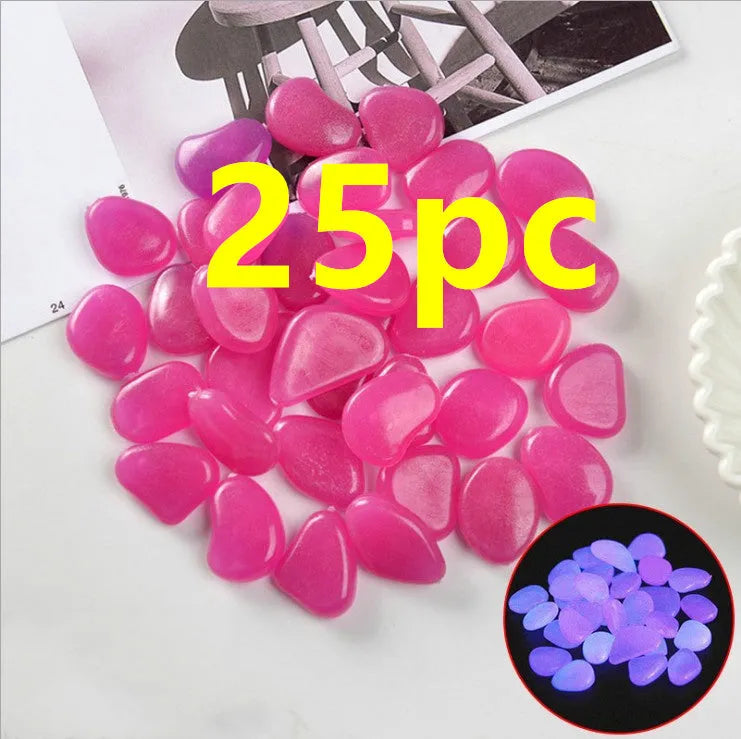 Luminous fluorescent aquarium and garden pebbles in mixed colours including dark purple, yellow, light blue, pink, orange