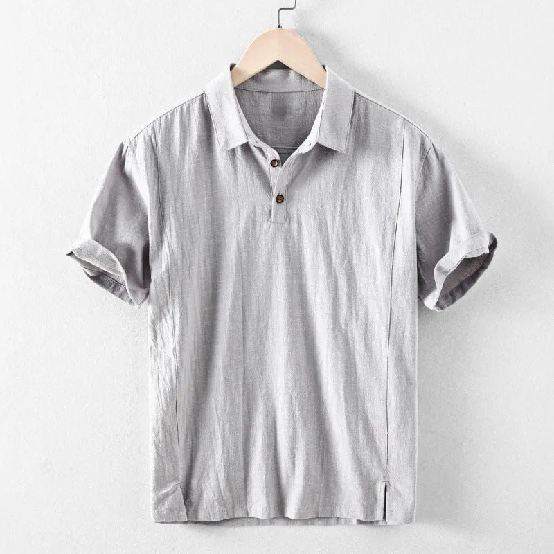 Men's loose fit linen shirt in a solid colour, shown in a light grey option.