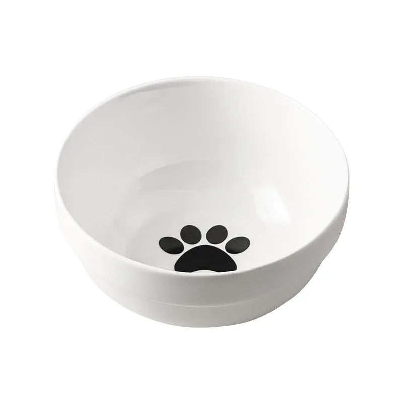 White ceramic cat bowl with decorative iron frame in cat ear design