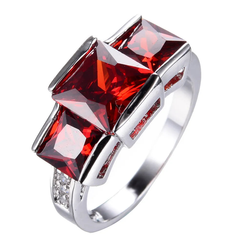 Geometric wholesale ring ornament in electroplated copper showing multiple colour options on a size 8 finger