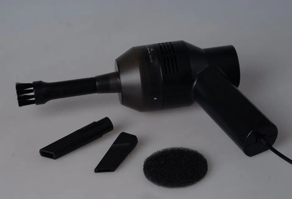 Black desktop mini vacuum cleaner for electronics and keyboard cleaning