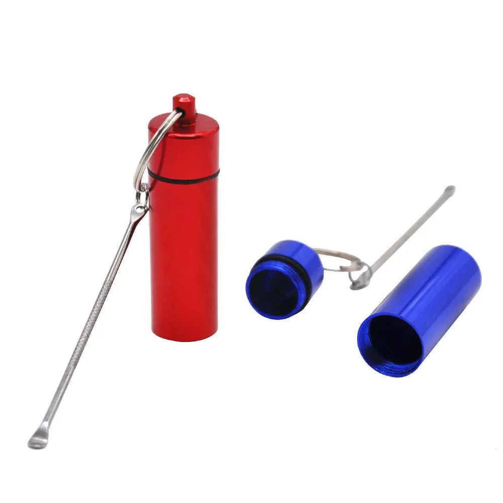 Blue aluminium portable medicine bottle with attached spoon and keychain for medication organisation