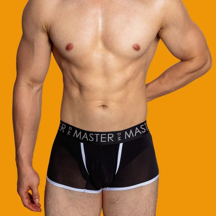 Men's solid colour low-waist ice silk shorts in army green, laid flat.