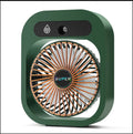 Green USB rechargeable misting fan with 3 speed settings and adjustable head on a desk