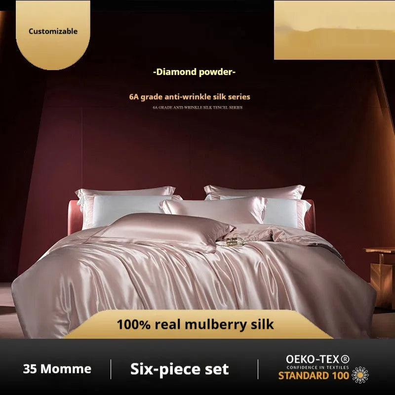 A silk four-piece quilt cover set in a solid colour, shown on a bed with matching sheets.
