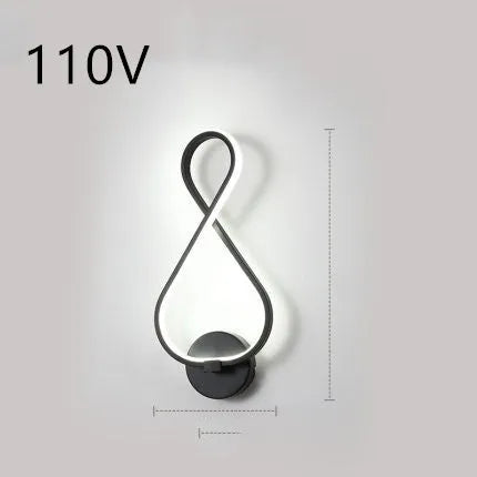 Minimalist Nordic design LED wall lamp with a silicone shade, mounted on a bedroom wall.