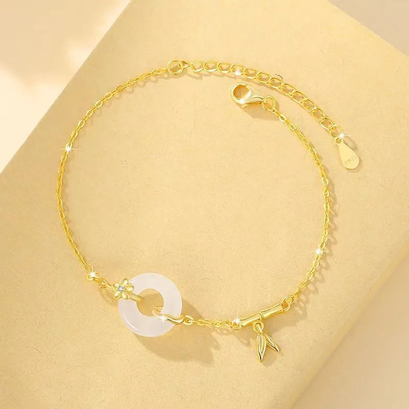 Silver gold bracelet with peace buckle clasp and white chalcedony starry sky design elements
