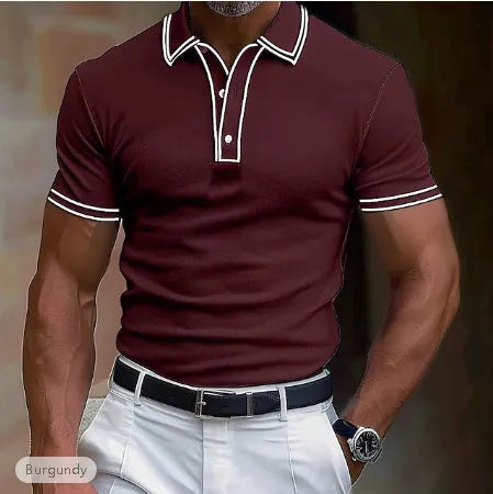 A man wearing a loose-fitting, striped short-sleeved T-shirt for casual summer leisure.