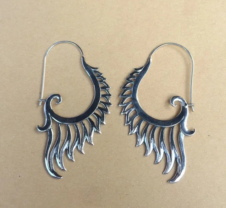 Silver retro creative women's earrings made from electroplated alloy in fashion OL style