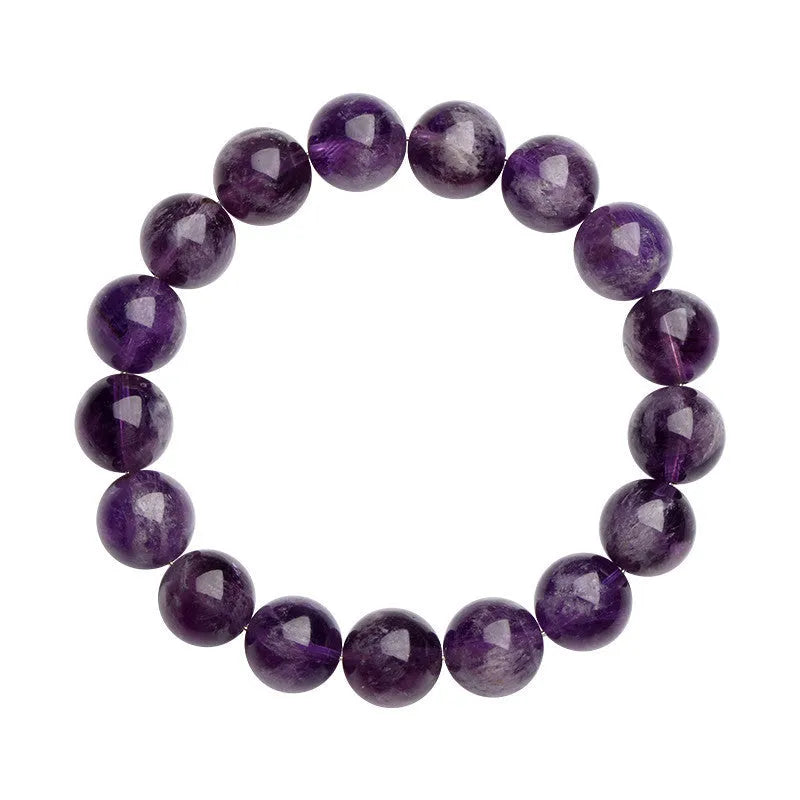 Snow Mountain feather amethyst crystal bracelet with scattered geometric beads and Ruyi element.