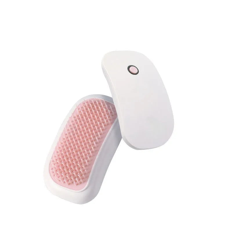 Pink electric pet massage brush with TPE teeth for cats and dogs