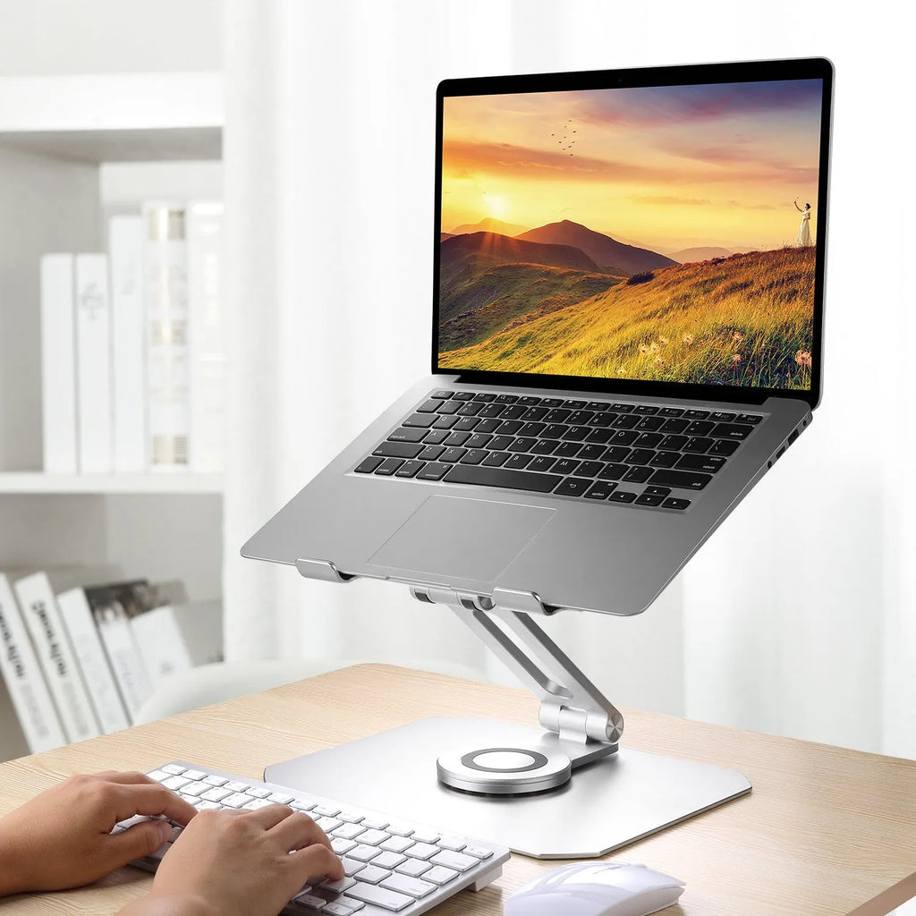 Silver aluminium alloy 360 degree rotating desktop laptop stand folded for storage