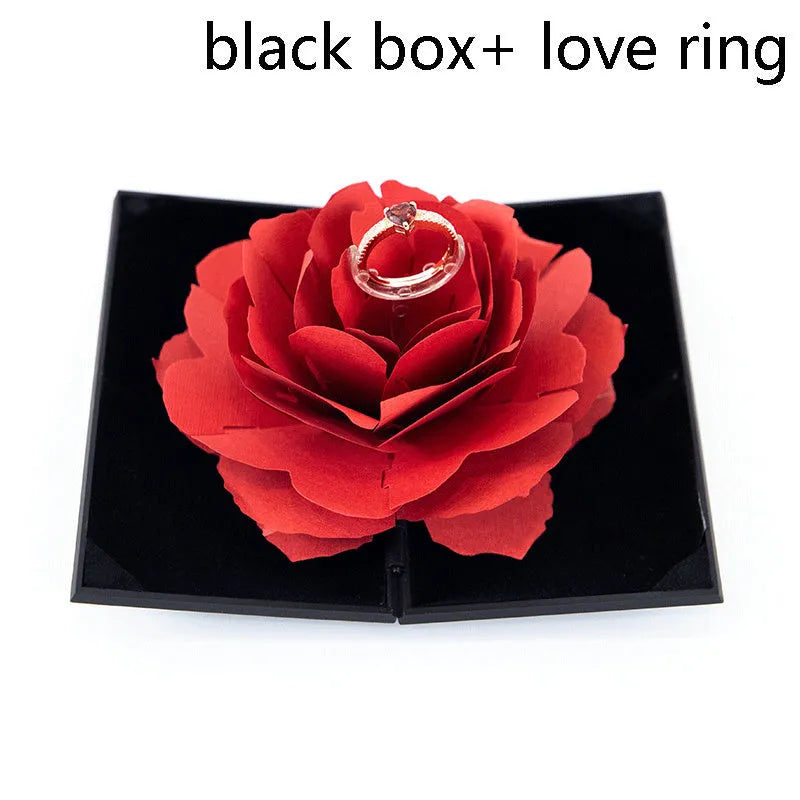 Red heart-shaped rotating ring box with 3D love motif and rose decoration for jewellery packaging