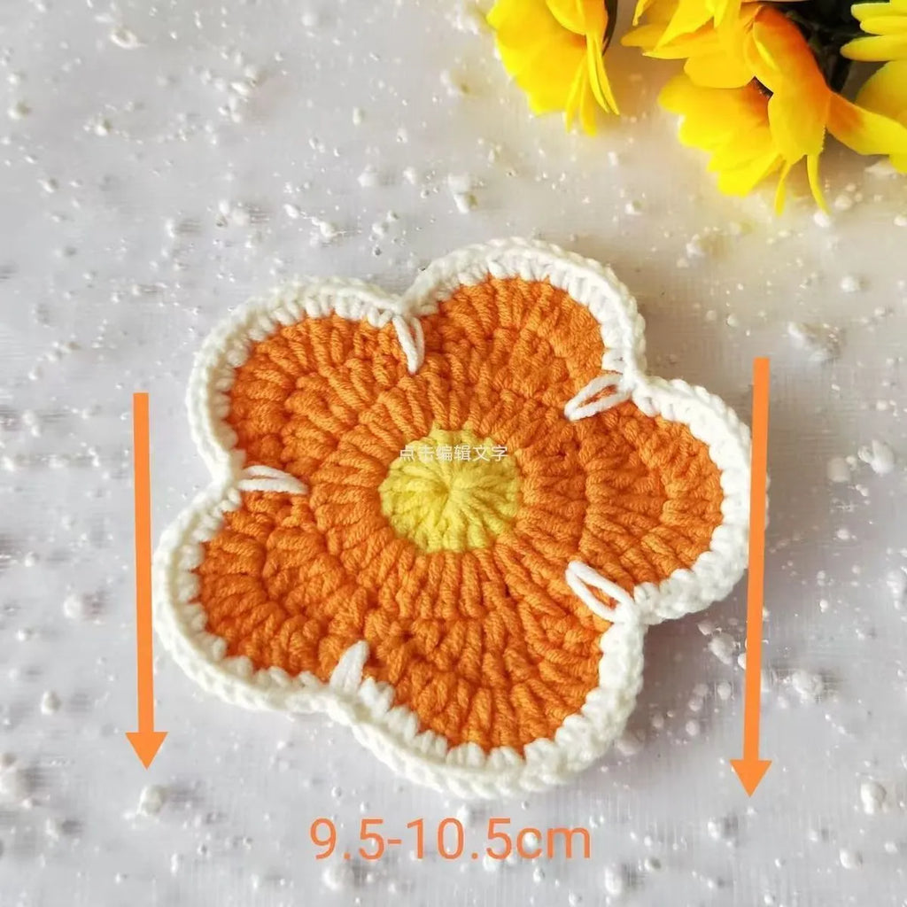 Set of five handmade woven floral placemats in blue, green, orange, pink, and purple colours.
