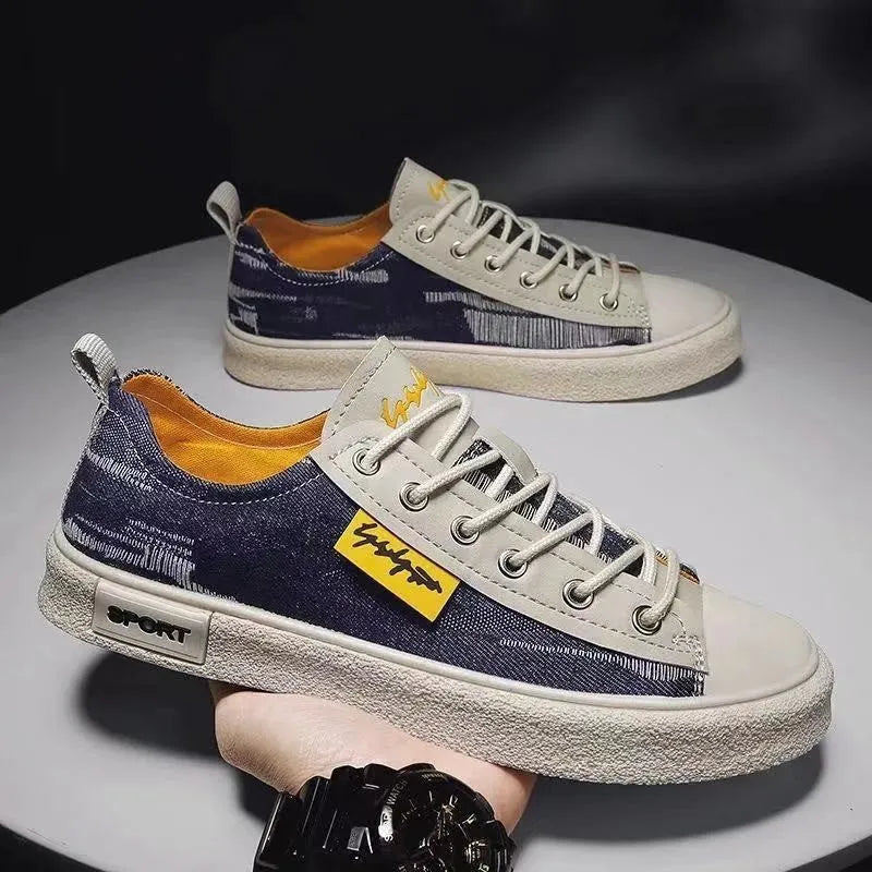 Men's casual canvas shoes in light blue with round toe, rubber sole, and lace-up closure.