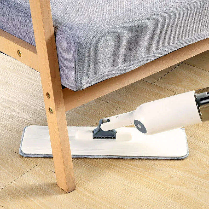 Flat squeeze mop with blue bucket and grey microfiber pad, rotating to show 360-degree head movement.