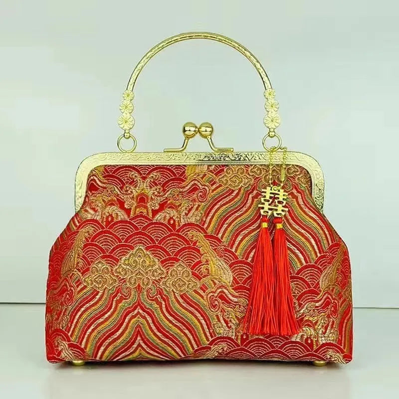 Chinese embroidery cheongsam handbag in polyester with shell shape and internal zipper compartment