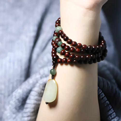 Rosewood beaded bracelet with 108 6mm beads and carved Hotian jade pendant centrepiece