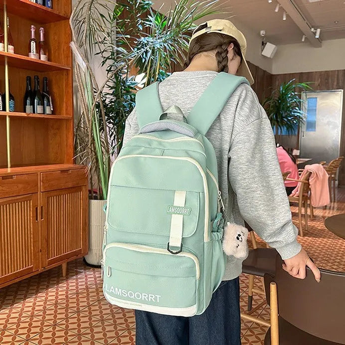 High school student backpack in waterproof nylon with curved shoulder straps and under 20L capacity