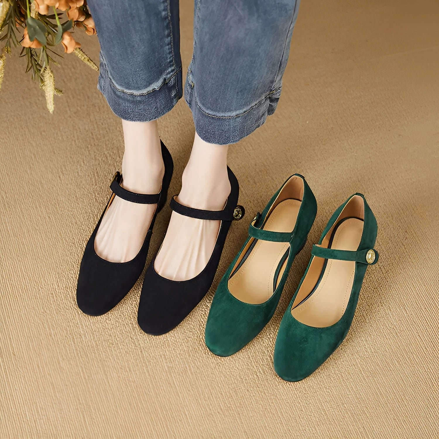 Women's black suede Mary Jane shoes with chunky heel and square toe bracket on white background