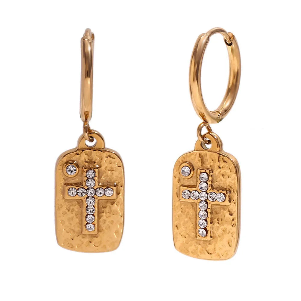 Gold micro inlay rhinestone cross hammer necklace on woman with quadrilateral geometric pendant on stainless steel chain