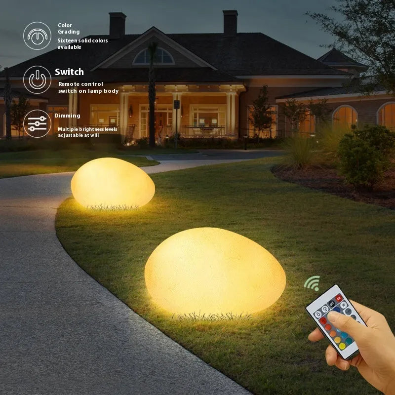 Outdoor pebble light in natural stone finish, geometric shape, IP65 waterproof, solar or rechargeable, 31cm size