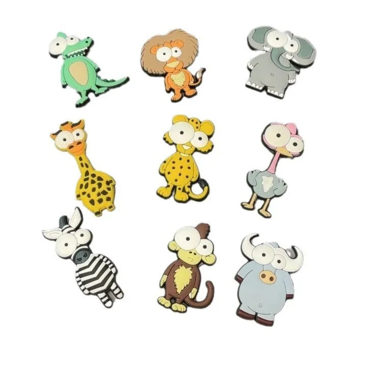 Set of 9 colourful PVC cartoon animal refrigerator stickers on a white fridge surface
