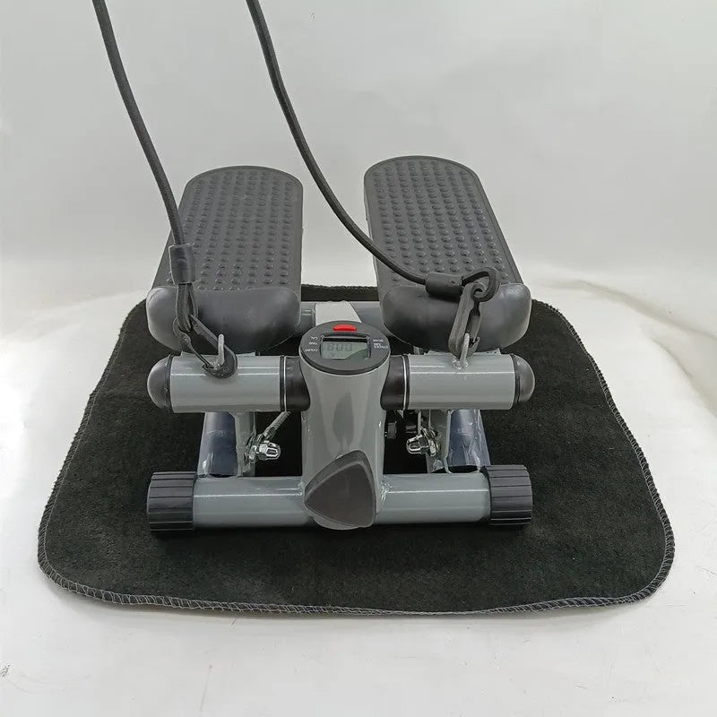 Silver grey hydraulic mini treadmill for waist slimming and home workouts.