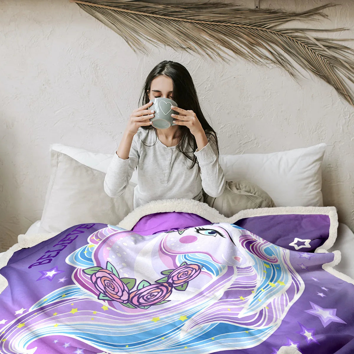 Purple unicorn themed lamb wool Sherpa fleece throw blanket 130x150cm with hemmed edges on sofa