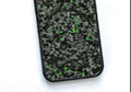 Samsung Galaxy S25 phone case in forged carbon fibre red finish, showing non-magnetic slim design