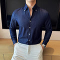 Men's slim fit long-sleeved denim shirt in black, shown in a cardigan style.