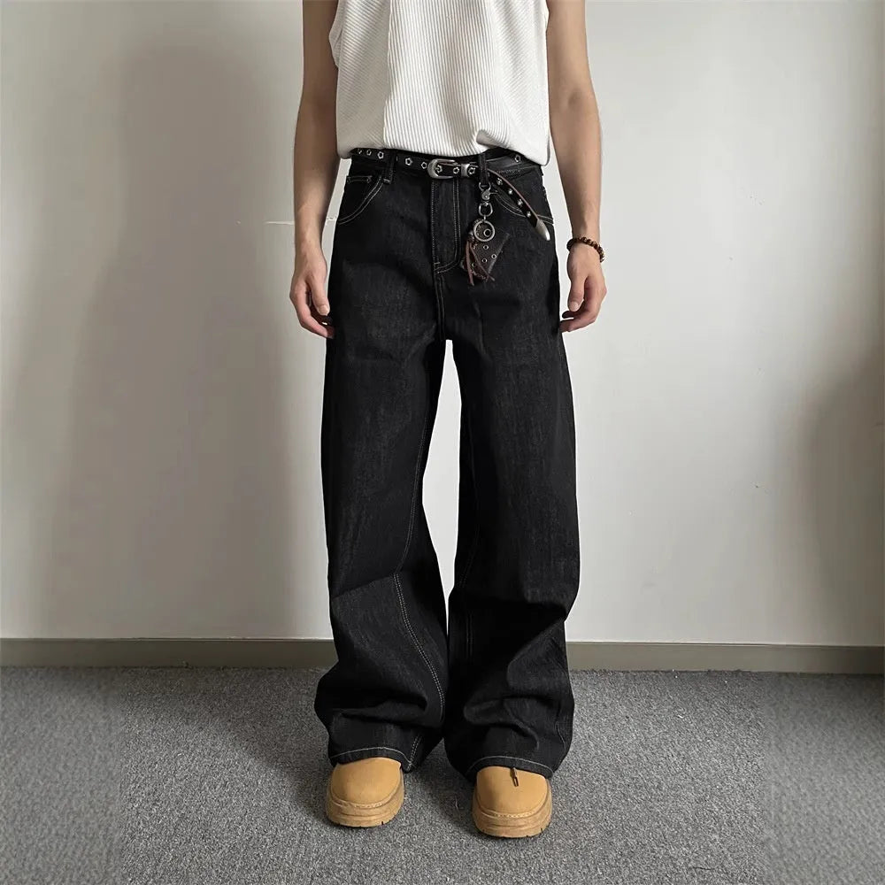 Black straight-leg wide jeans with zip fly and mid-waist design