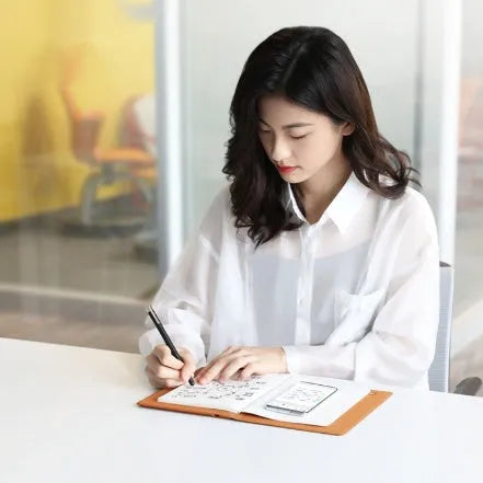 Huion Note X10 Smart Digital Notepad in Elk Brown with passive pen and magnetic pencil case