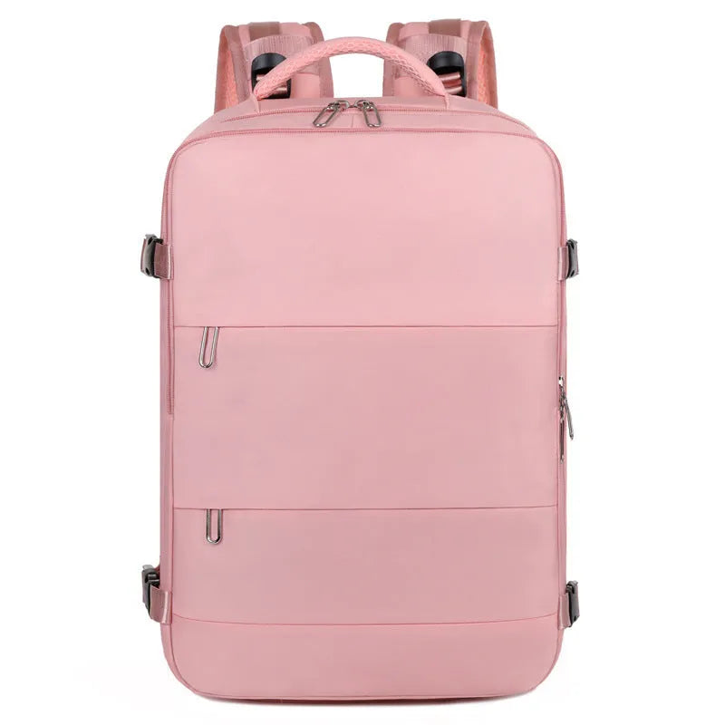 Large grey travel backpack for women with multiple compartments, shown open.