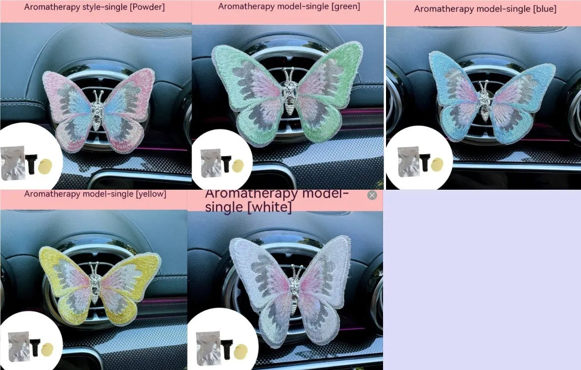 Fabric embroidered butterfly car air vent decoration in multiple colour options on a dashboard.