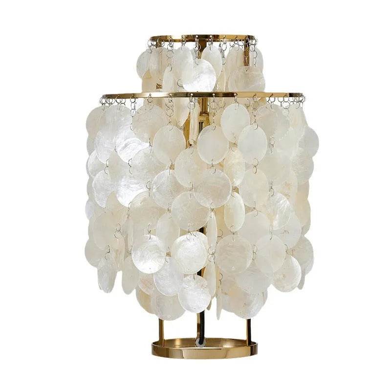 Shell-shaped bedside table lamp in chrome finish measuring 30cm diameter by 46cm tall