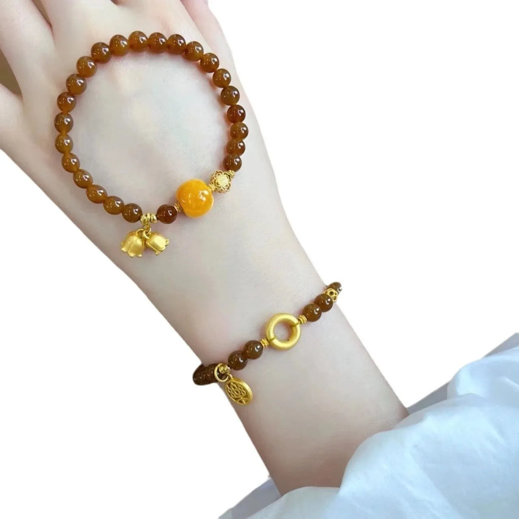 Women's caramel beeswax coloured Lily flower bracelet with electroplated finish