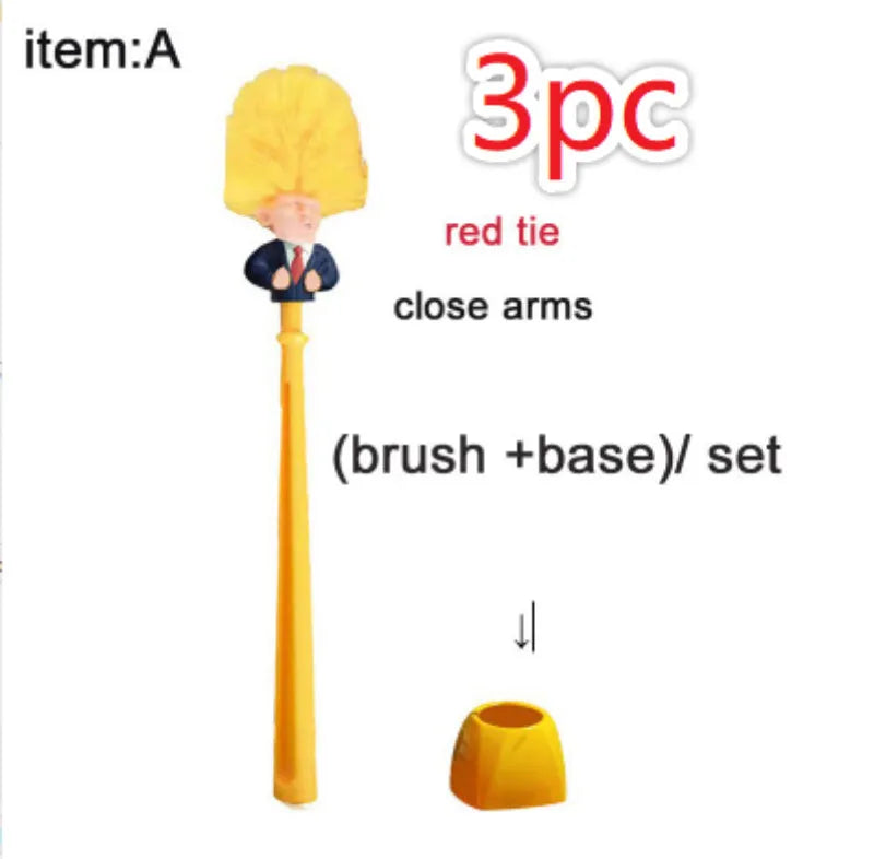 Yellow plastic Donald Trump toilet brush with hanging slot on handle.