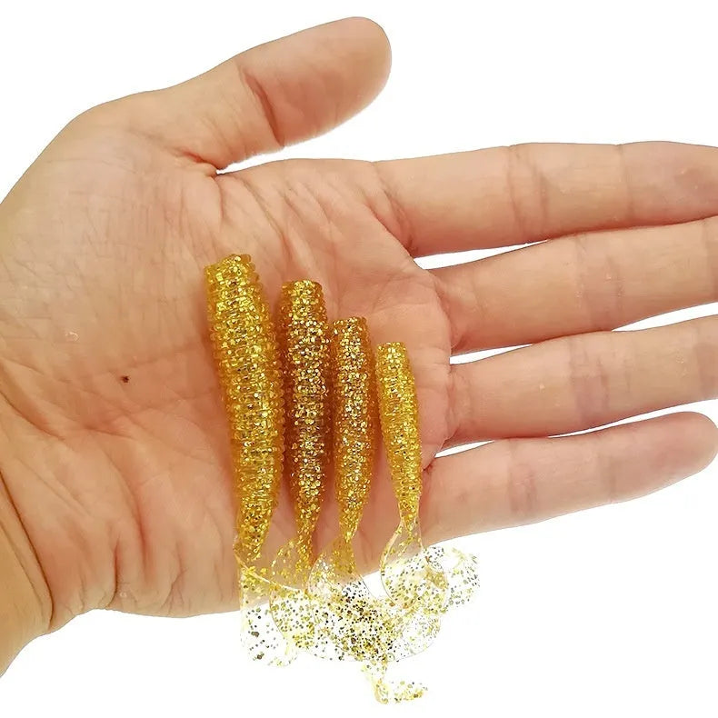 Soft worm rolled tail fishing lure in flash gold colour, 7.5cm size, with segmented PVC body and tapered tail