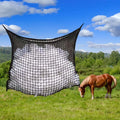 Woven polyethylene rope hanging feeding bag for livestock in a grid design.