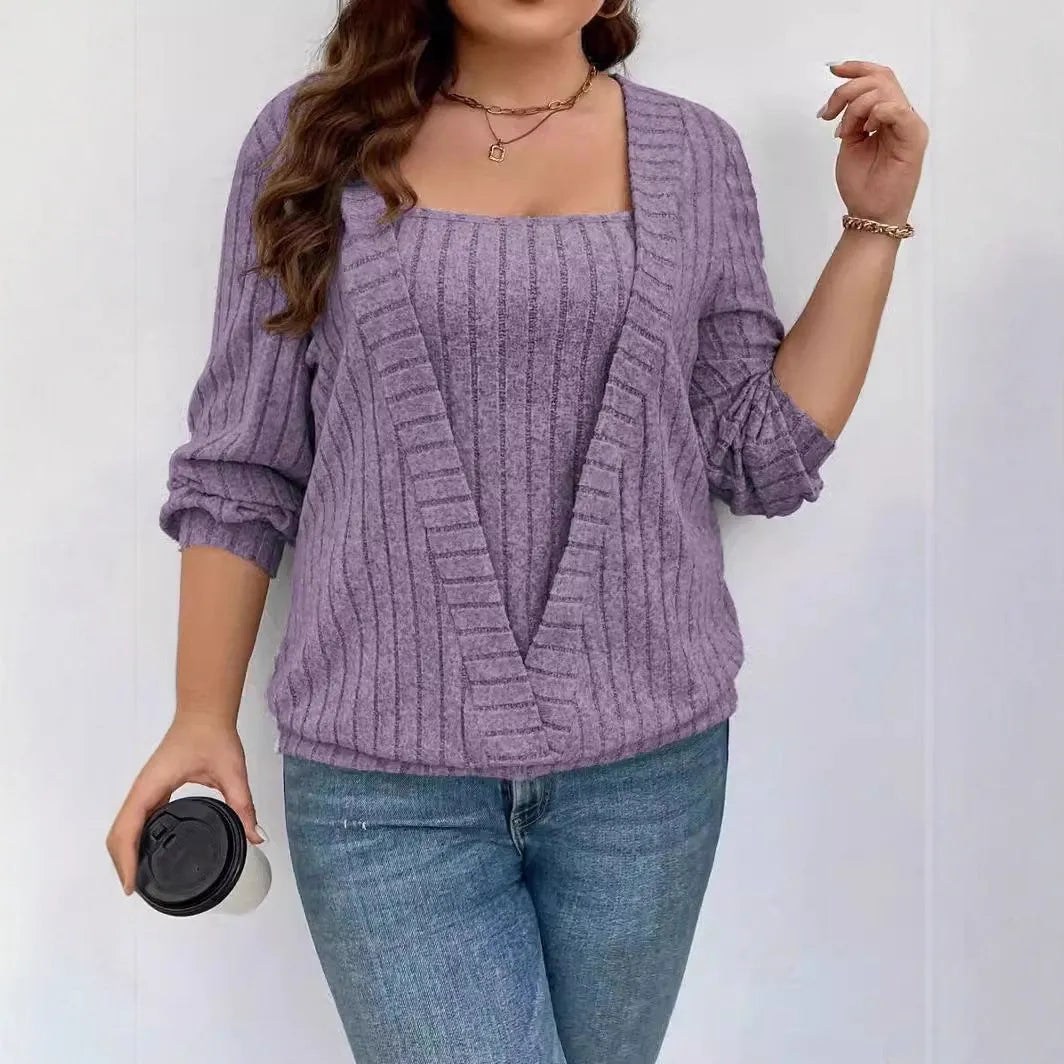 Women's solid colour rib fabric false two-piece suit with V-neck and long sleeves.