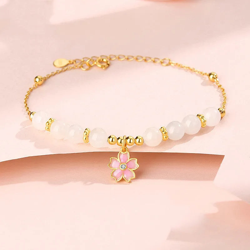 S925 sterling silver cherry blossom pendant with gradient pink epoxy on Hetian jade beaded bracelet