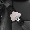 Creative cartoon plush universal automobile seat belt shoulder protector in big-eyed panda design on a grey car seat belt
