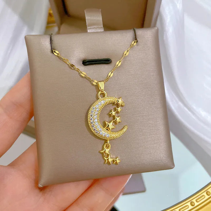 Geometric moon tassel necklace with diamond-cut facets and stainless steel chain