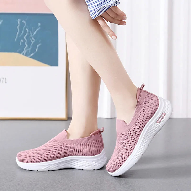 Women's casual mesh slip-on shoes, breathable sock style, soft plastic sole, available in black grey khaki pink
