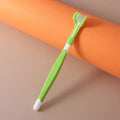 Pet toothbrush with nylon bristles and plastic handle in green colour