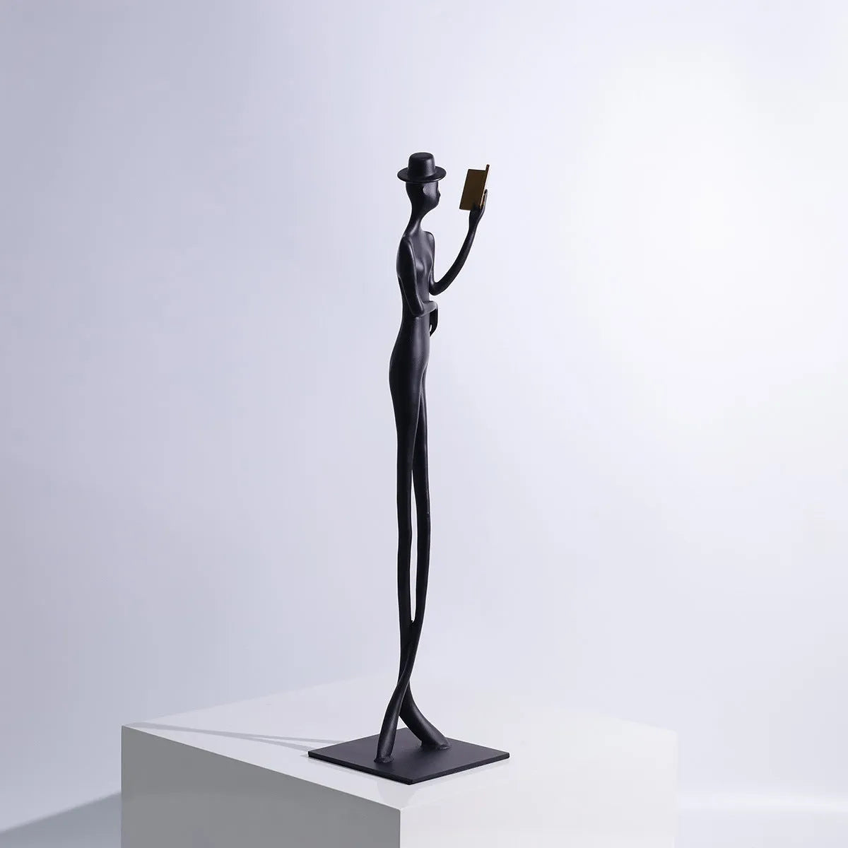 Black metallic reading woman aluminium desktop sculpture 51cm tall modern decor
